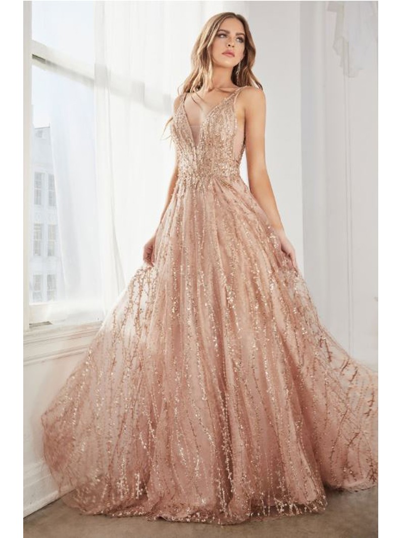 A shimmering ball gown with layered tulle and glitter lace and all-over  print. V-neckline with sheer illusion in centre front.
